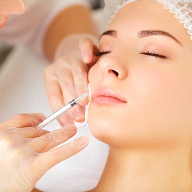 A woman having Botox injected