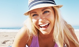 woman at beach smiling