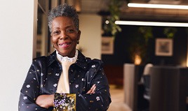 Closeup of senior woman smiling in office