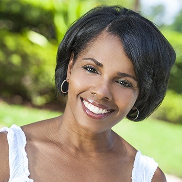 woman smiling outside