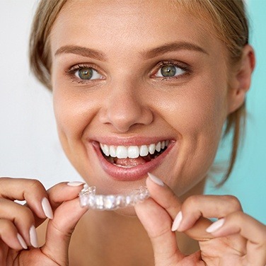 woman smiling with invisalign