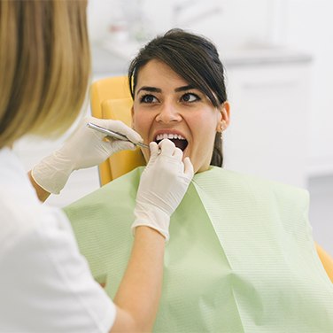 woman getting dental work done