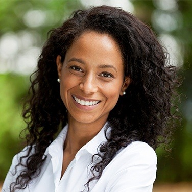 woman in white smiling